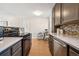 Charming kitchen featuring stainless steel appliances and stylish countertops at 1324 S Niagara St, Denver, CO 80224