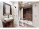 Stylish bathroom featuring a modern sink vanity and tiled walk-in shower at 2636 Trailblazer Way, Castle Rock, CO 80109