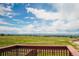 Enjoy clear backyard views from the deck, perfect for relaxation and nature appreciation at 9927 Aftonwood St, Highlands Ranch, CO 80126