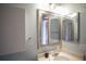Bathroom featuring vanity with sink and decorative mirror at 9927 Aftonwood St, Highlands Ranch, CO 80126