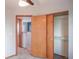 Bedroom includes closet and door to hallway at 9927 Aftonwood St, Highlands Ranch, CO 80126