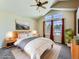 This virtually staged primary bedroom offers a bright and relaxing living space at 1674 Bent Grass Cir, Castle Rock, CO 80109