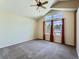Spacious bedroom with vaulted ceilings and large windows, offering great natural light at 1674 Bent Grass Cir, Castle Rock, CO 80109
