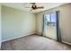 Empty bedroom features a neutral color palette and a window for natural light at 1674 Bent Grass Cir, Castle Rock, CO 80109