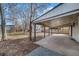 Spacious backyard with a large covered patio and storage shed, perfect for outdoor living at 3000 S Jackson St, Denver, CO 80210