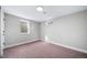 Finished basement bedroom, with carpet, recessed lighting, and a window at 3000 S Jackson St, Denver, CO 80210