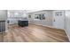 Spacious open-concept kitchen with modern finishes, a large island, stainless appliances, and ample natural light at 3000 S Jackson St, Denver, CO 80210