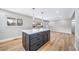 Spacious kitchen island with quartz countertop, modern appliances, and ample room for entertaining at 3000 S Jackson St, Denver, CO 80210