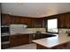 Well-equipped kitchen with modern appliances, ample counter space, and a stunning view at 21849 Cabrini Blvd, Golden, CO 80401