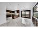 Modern kitchen with stone countertops, updated appliances, and a stunning view at 21849 Cabrini Blvd, Golden, CO 80401