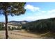Scenic view with mature trees, landscape and distant city view at 21849 Cabrini Blvd, Golden, CO 80401