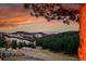 Beautiful landscape view at sunset, featuring hills, lush trees, and serene natural beauty at 21849 Cabrini Blvd, Golden, CO 80401