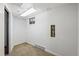 Finished basement space with carpet flooring, window, and utilities access at 9350 Raleigh Ct, Westminster, CO 80031
