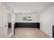 Versatile bonus room with tile flooring and a view to the exterior at 9350 Raleigh Ct, Westminster, CO 80031