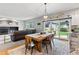 Cozy dining area with a view of the backyard and a comfortable seating arrangement at 15483 W 51St Pl, Golden, CO 80403