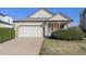Lovely single-Gathering home with a well-maintained lawn, two car garage and inviting entrance at 20451 Kelly Pl, Denver, CO 80249