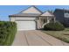 Single-Gathering home with a well-maintained lawn, two car garage and inviting entrance at 20451 Kelly Pl, Denver, CO 80249