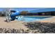 Outdoor community pool features a water slide and ample space for swimming laps at 20451 Kelly Pl, Denver, CO 80249