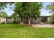 Charming backyard featuring a well manicured lawn, patio area and landscaping at 5436 E Atlantic Pl, Denver, CO 80222