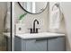 Modern bathroom featuring new faucet and vanity at 5436 E Atlantic Pl, Denver, CO 80222