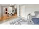 Open-concept space with dining area, tile flooring and a view of the kitchen at 5436 E Atlantic Pl, Denver, CO 80222