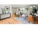 Bright and airy living room with hardwood floors and an open layout at 5436 E Atlantic Pl, Denver, CO 80222