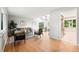 Bright, open living room with hardwood floors and modern furnishings at 5436 E Atlantic Pl, Denver, CO 80222