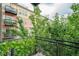 Relaxing balcony overlooking lush greenery and offering a private outdoor space at 13456 Via Varra # 225, Broomfield, CO 80020