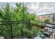 Inviting balcony with flower boxes offering a serene outdoor retreat and natural ambiance at 13456 Via Varra # 225, Broomfield, CO 80020