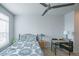 Bedroom featuring a ceiling fan, natural light, and a neutral color scheme at 13456 Via Varra # 225, Broomfield, CO 80020