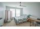 Cozy bedroom with a ceiling fan and lots of natural light, creating a comfortable sanctuary at 13456 Via Varra # 225, Broomfield, CO 80020