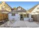 Charming backyard featuring string lights, outdoor seating, and well-maintained landscaping at 3521 Osage St, Denver, CO 80211