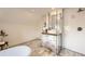 Chic bathroom with stylish vanity, glass-enclosed shower, and modern tiling at 3521 Osage St, Denver, CO 80211