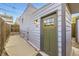 Charming home featuring an inviting entrance, neutral siding, and convenient side access at 3521 Osage St, Denver, CO 80211