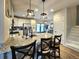 Modern kitchen featuring granite countertops, stainless steel appliances, and a spacious island with seating at 13640 Garfield St # A, Thornton, CO 80602