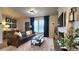 Inviting living room with modern furnishings, a fireplace, and a large rug at 13640 Garfield St # A, Thornton, CO 80602
