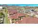 Residential community with multiple townhomes, tree-lined streets, and mountain views in the background at 5822 S Van Gordon Ln, Littleton, CO 80127