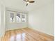 Bedroom with natural light, neutral walls, hardwood floor, ceiling fan and plenty of sunlight at 5822 S Van Gordon Ln, Littleton, CO 80127