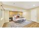 Basement bedroom features luxury vinyl plank flooring, and a shiplap accent wall at 5822 S Van Gordon Ln, Littleton, CO 80127