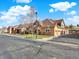 Exterior view of the property shows garages and convenient street parking at 5822 S Van Gordon Ln, Littleton, CO 80127