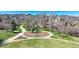 Inviting neighborhood playground with slides and climbing equipment, perfect for Gathering fun at 5822 S Van Gordon Ln, Littleton, CO 80127