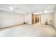 Large basement featuring carpet and several entry doors at 510 Silhouette Way, Monument, CO 80132