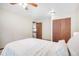 Spacious bedroom featuring large bed, closet and an entryway to another room at 510 Silhouette Way, Monument, CO 80132