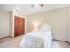 Bright bedroom featuring closet and white furniture at 510 Silhouette Way, Monument, CO 80132