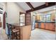 Charming kitchen featuring a breakfast bar with seating, stainless steel appliances, and ample natural light at 510 Silhouette Way, Monument, CO 80132