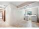 Laundry room with tile floor, washer, dryer, and a window for natural light at 510 Silhouette Way, Monument, CO 80132