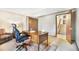 Office space featuring vintage desk, rolling desk chair, and a view of the stairs at 510 Silhouette Way, Monument, CO 80132