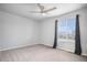 Cozy bedroom with neutral wall colors and carpet flooring at 42888 Ivydel St, Elizabeth, CO 80107