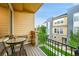Charming balcony with seating, wood decking and views of the exterior at 6745 S Tempe Ct, Aurora, CO 80016
