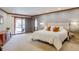 The main bedroom features an outside entrance and stylish decor at 40 Charlou Cir, Cherry Hills Village, CO 80111